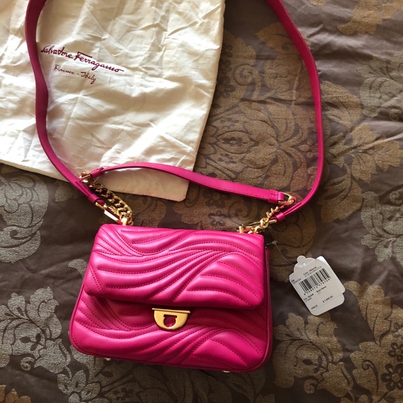 Hot Pink Juicy Couture Charmed Satchel with hot pink heart  Gorgeous hot pink Bag